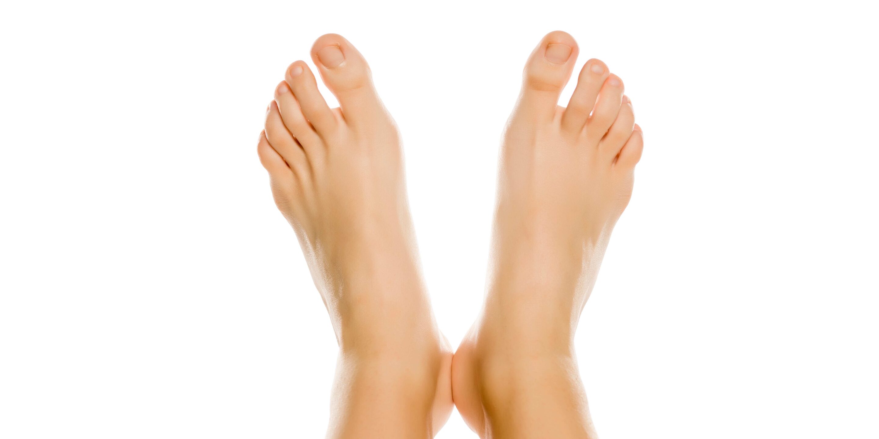 Person's clean feet on white background
